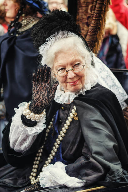 Queen Victoria present at the Dickens festival in Deventer Deventer, The Netherlands,  December 21, 2014: Queen Victoria present at the Dickens festival in Deventer charles dickens stock pictures, royalty-free photos & images