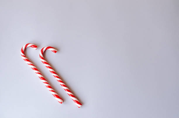 istock Two cane candies on a gray background. 1072543398