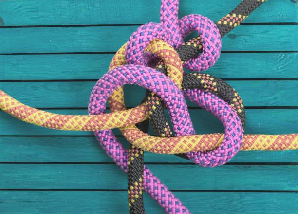 Rope. Knot on a colorful cord  on wooden background lace fastener photos stock pictures, royalty-free photos & images