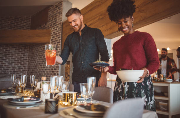 istock They love to participate in table preparation 1072549326