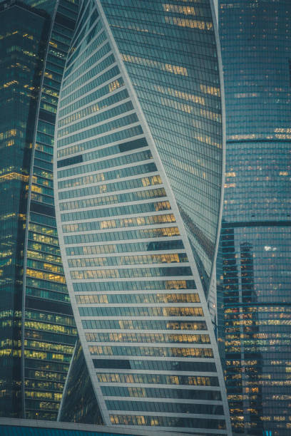 istock Evolution Tower and Imperia Tower in district Moscow city. Business centre. Offices in skyscrapers. City pattern. Night and sunset. 1072555340