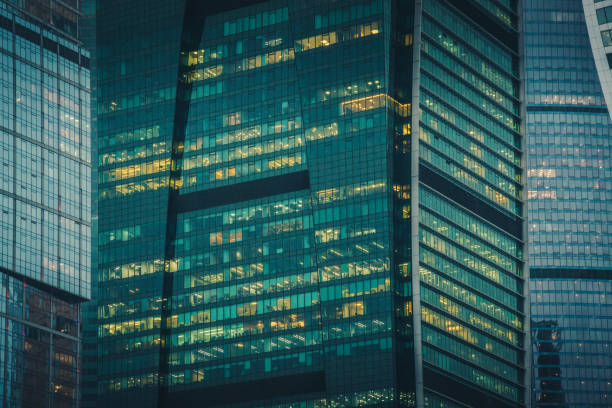 istock Imperia Tower in district Moscow city. Business centre. Offices in skyscraper. Urban pattern. Night and sunset in city. 1072555352