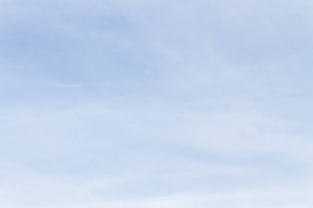 istock Blue sky with white porous clouds in summer 1072562992
