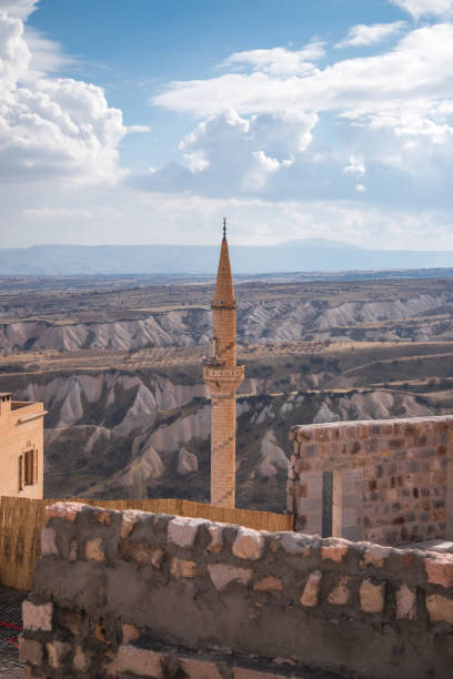 istock Goreme in Cappadocia with minaret landscape 1072564500