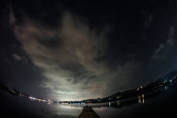 istock Lake Yamanaka and the starry sky 1072569636