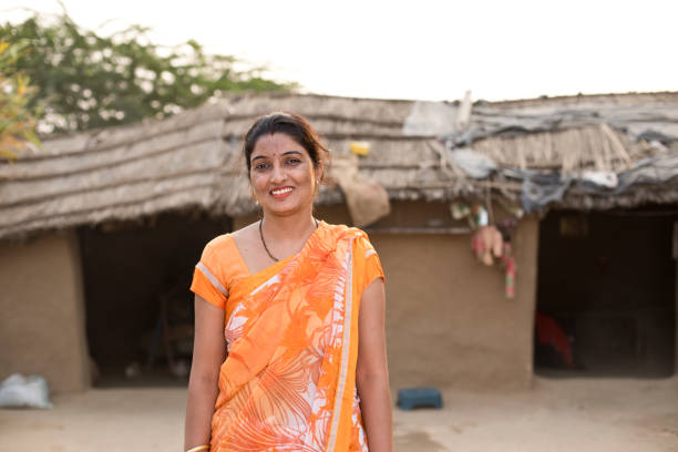 istock Indian woman standing at village 1072573952