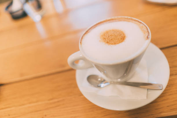 istock coffee cup on a wooden table 1072574808