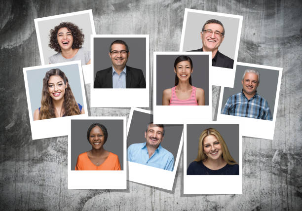 istock Multi-Ethnic Group Of People Smiling Portraits 1072579140