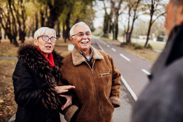 istock Senior couples in the park 1072580486