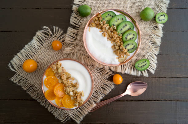 istock Natural healthy yogurt with muesli and fruit. 1072584496