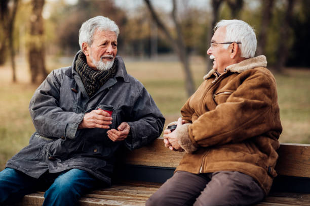 istock Smiling men in the park 1072584972