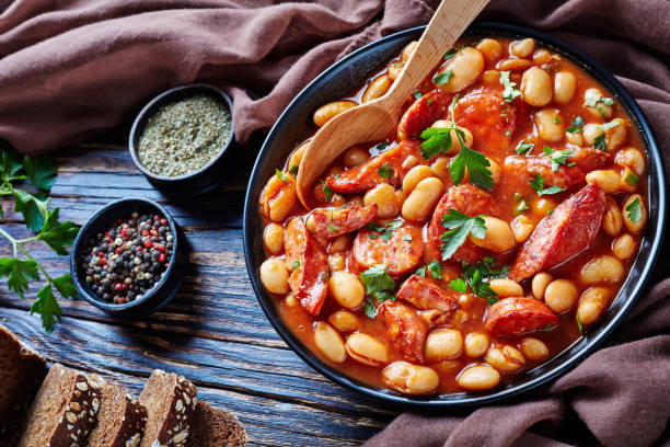 istock hearty beans stew with sausages and herbs 1072585102