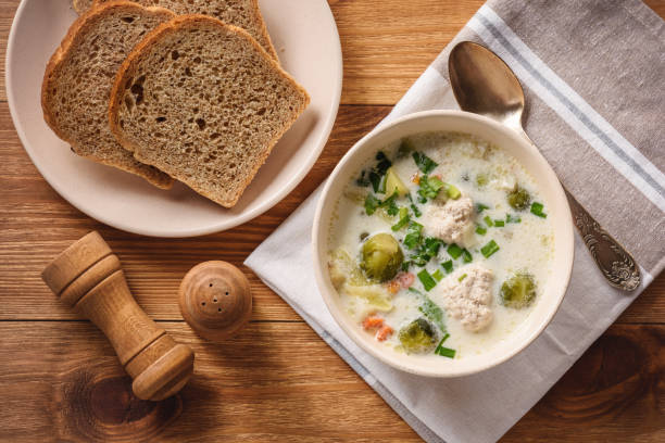 istock Creamy soup with vegetables and turkey meatballs. 1072593852