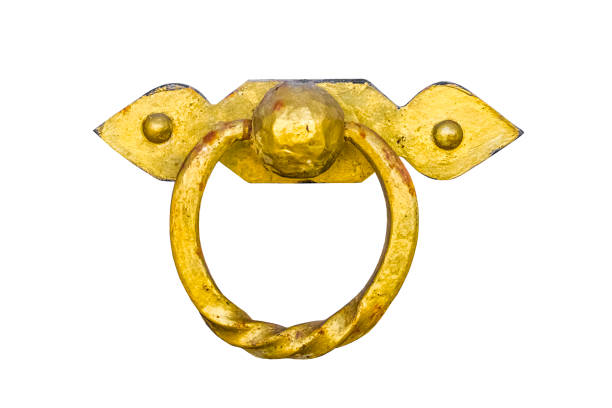 istock Door knocker with a gold ring on a white background 1072595728