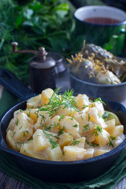 istock fresh potatoes cooked in sour cream, selective focus 1072599054