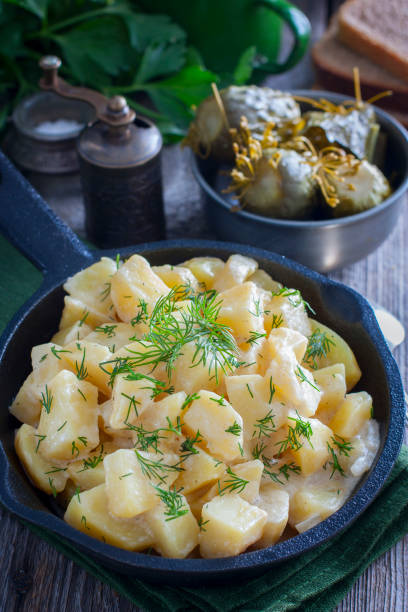 istock fresh potatoes cooked in sour cream, selective focus 1072599114