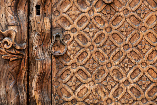 Old colonial wood door. Hardwood with much woodwork found in Mexico moulding door jamb wood stock pictures, royalty-free photos & images