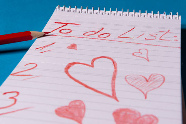 istock To do list with heart shapes drawn on a spiral notebook 1072601924
