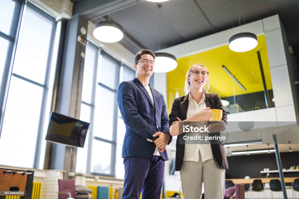 We are the successful leaders at this company Portrait of young coworkers. They are well dressed,they are also smiling a lot. 20-24 Years Stock Photo