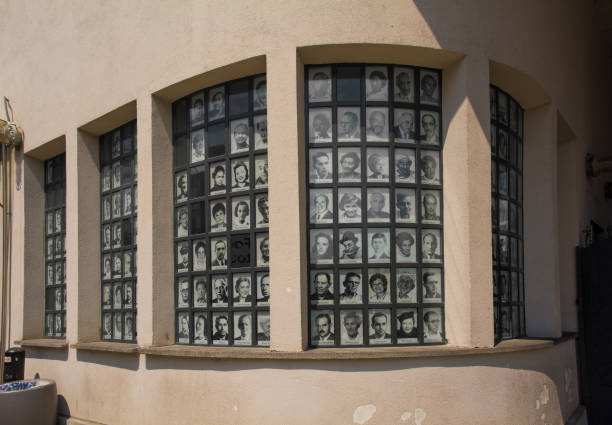 Krakow, Poland - July 10th 2018. The exterior of the Schindler Factory in Krakow displaying the photographs of many former workers