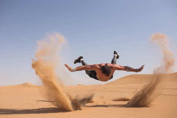 istock Man doing extreme push ups in the desert 1072608994