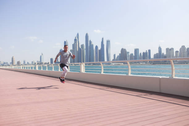 istock Athlete running in Dubai marina 1072609862