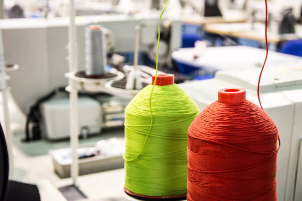 Free Stock Photo of Two Spools of Thread and a Spool of Thread on a ...