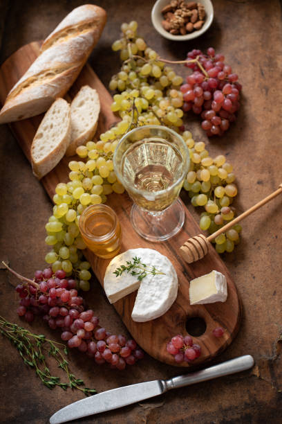 istock French Camembert cheese and grapes 1072618332