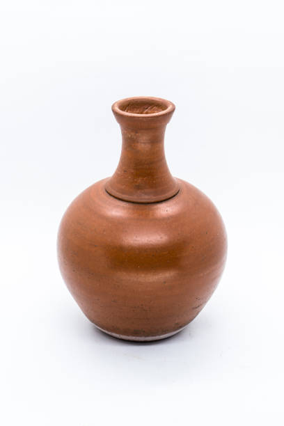 istock Water clay pot isolated 1072640762