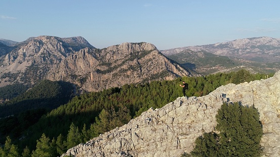 Man Traveler with big backpack mountaineering Travel Lifestyle concept