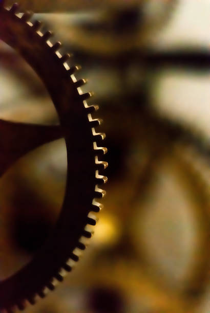 istock blurred background - a fragment of the clock mechanism 1072650098