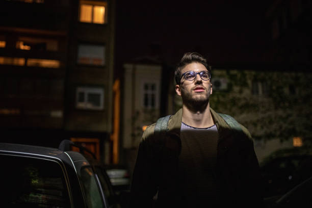 istock Serious and confident hipster walking in a dark street 1072656586