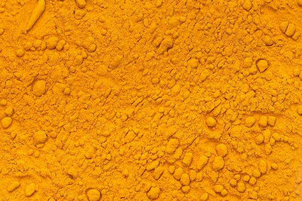 istock Pile of curcuma powder 1072660460