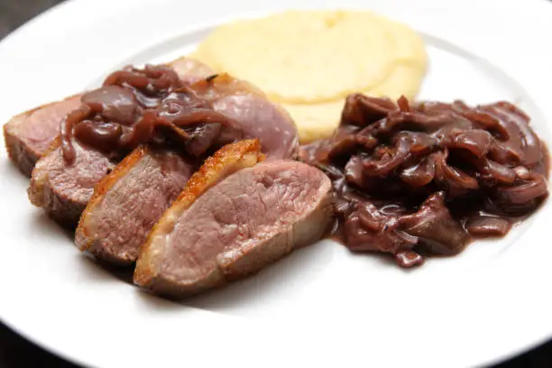 duck breast with mashed potato and redwine onion sauce