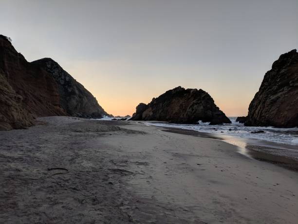 istock Sunrise over rock in big sur 1072663620