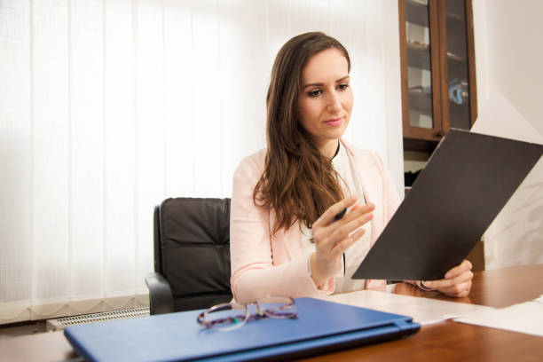istock Business woman working in her office 1072673306