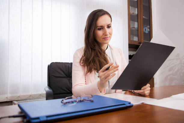 istock Business woman working in her office 1072673354