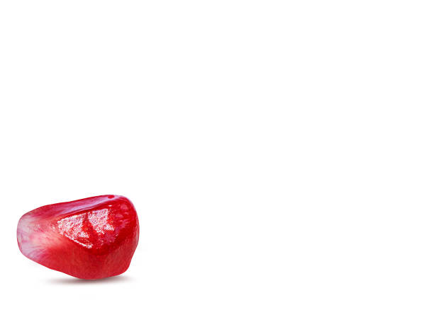 istock Pomegranate seeds isolated on white background with clipping path 1072682796
