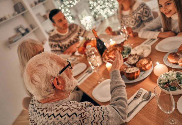 istock The family having a christmas dinner 1072683280