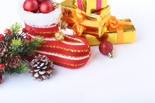 istock Merry Christmas composition. Santa's shoe with gift boxes isolated on white background. Happy holidays. 1072688564