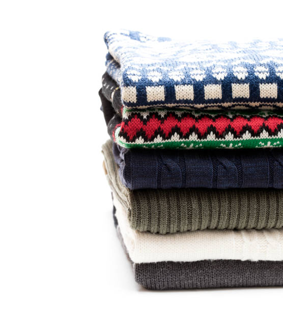 istock Folded knitwear sweaters isolated on white 1072689562