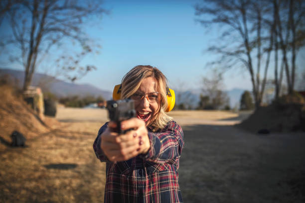 istock Woman shooter at the shooting range 1072711826