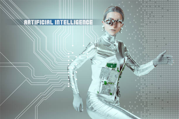 istock silver cyborg walking and looking at camera on grey with 
