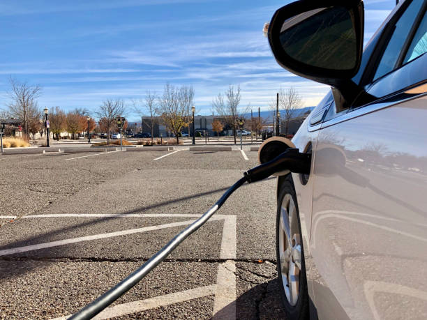 istock Small Electric Vehicle Charging Port Being Used 1072741668