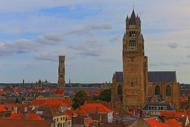 istock Above Bruges rooftops and towers - medieval old town - Belgium 1072744190