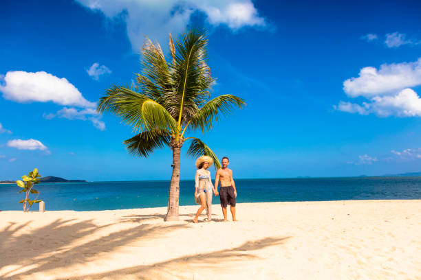 istock Couple on tropical beach 1072753264