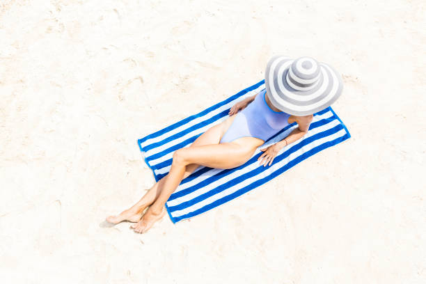 istock Woman at tropical beach 1072753280
