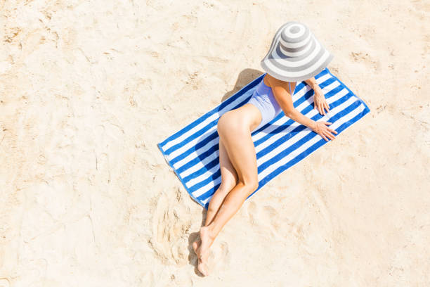 istock Woman at tropical beach 1072753284