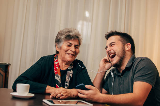 istock Young man with his grandmother 1072757636