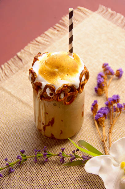 Iced chocolate milk drink with cookies